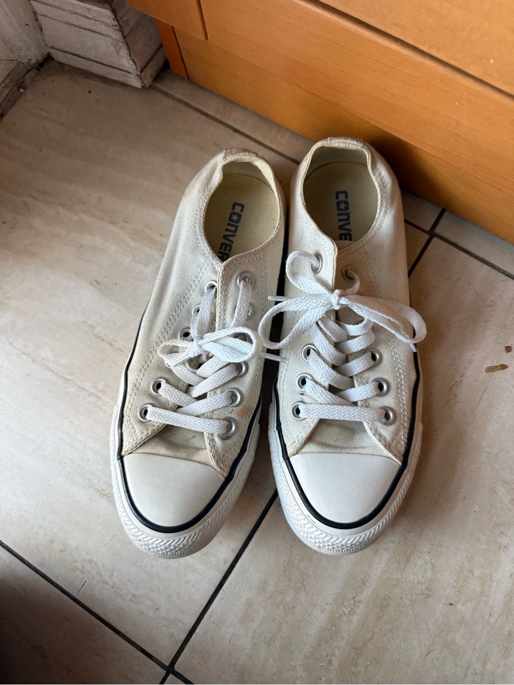 Converse Low Top Canvas Sneakers in Off-White with Black Trim